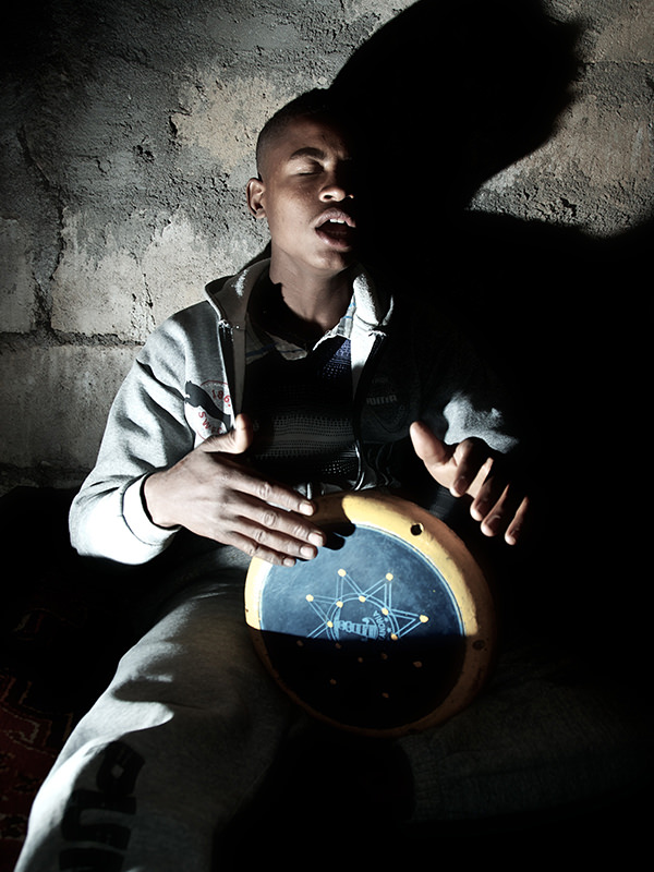 Person Playing a Hand Drum